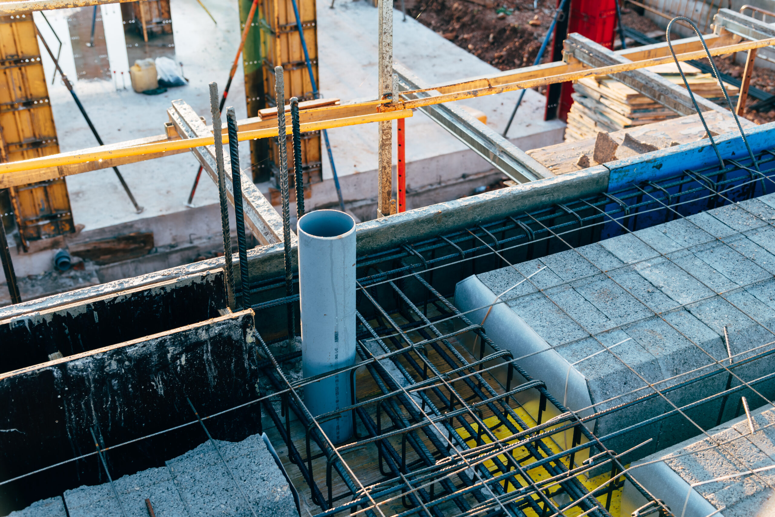 View of construction site with reinforced concrete slab.